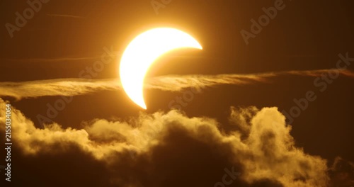 Partial Solar eclipse during a sunset on 12th of August 2026 behind a forest in rural Estonia, Northern Europe