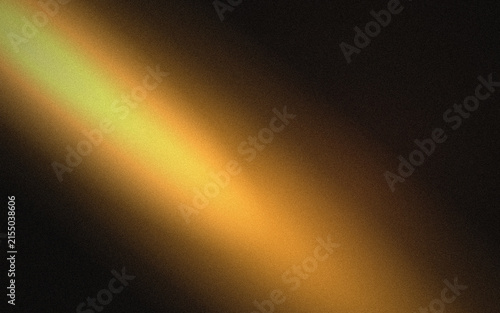 A warm and golden diagonal beam of light shining across a dark black background, with a grainy, texture that creates, a soft and, cinematic atmosphere