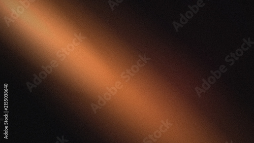 Foto A warm orange beam of light shining diagonally across a dark, grainy, and textur