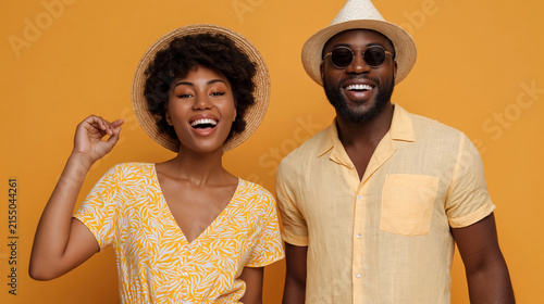 Happy young man and woman posing together in sun hats and seasonal outfits, ideal for tourism, summer fashion, and holiday advertising