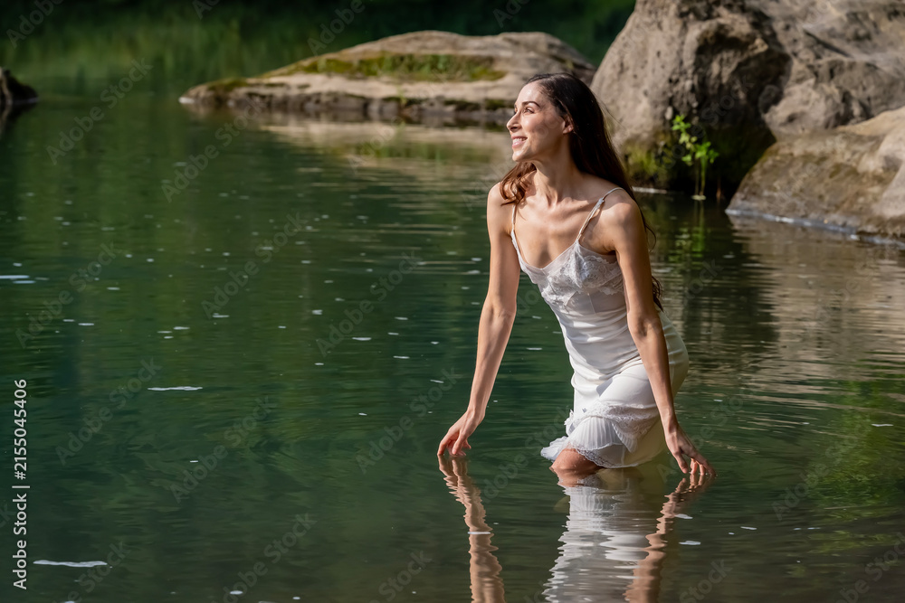 Fototapeta premium A Lovely Model Poses Outdoor While Enjoying The Summer Weather
