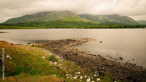 Bild auf Leinwand Tranquil morning light over Lough Inagh in Connemara National Park, calm lake re