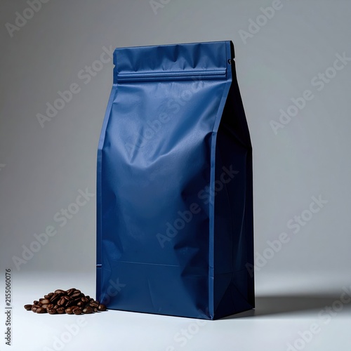 Isolated dark blue coffee pouch with roasted beans, blank packaging for branding, mockup presentation, retail product display