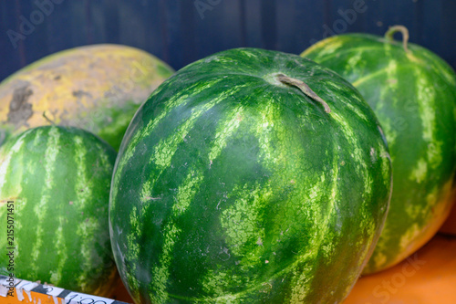 Photography Freshly picked watermelons sit under the warm sun at a vibrant farmers market re