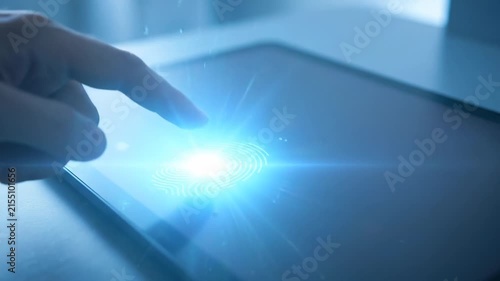 Finger touch fingerprint scanner on digital identity tablet for secure security authentication access on touchscreen technology