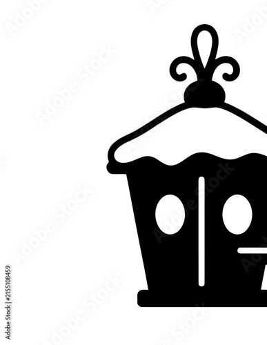 Black silhouette of a cottage with snow on the roof.