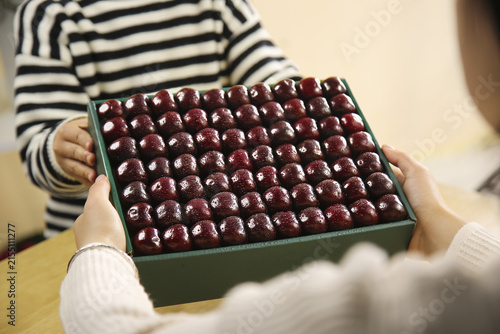 Bild auf Leinwand Fresh Early Cherries from Shandong and Chile - Premium Imported Fruit in Market