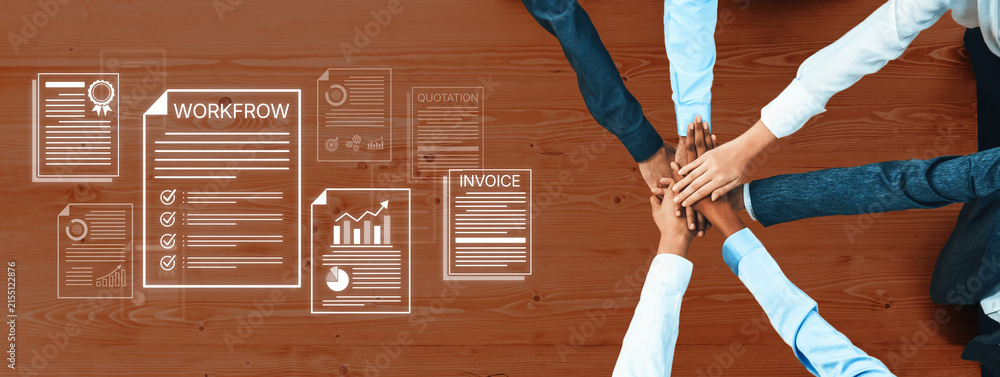 Obraz premium Team Collaboration and Workflow Management with Hands Over Documents on a Wooden Table in a Professional Office Setting. Bitwise.