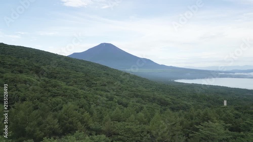 Aerial drone footage of Mount Fuji and lake Yamanaka on a summer morning, Yamanashi