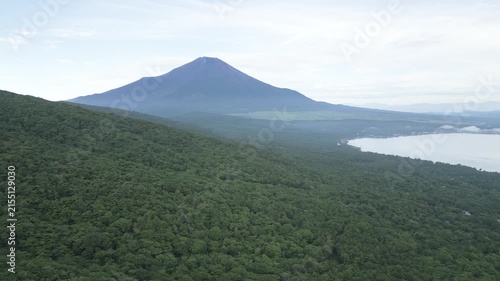 Aerial drone footage of Mount Fuji and lake Yamanaka on a summer morning, Yamanashi