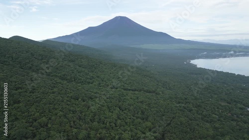 Aerial drone footage of Mount Fuji and lake Yamanaka on a summer morning, Yamanashi