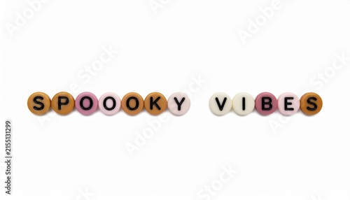 Spooky Vibes Text Made With Colorful Plastic Letter Beads Isolated On White Background.