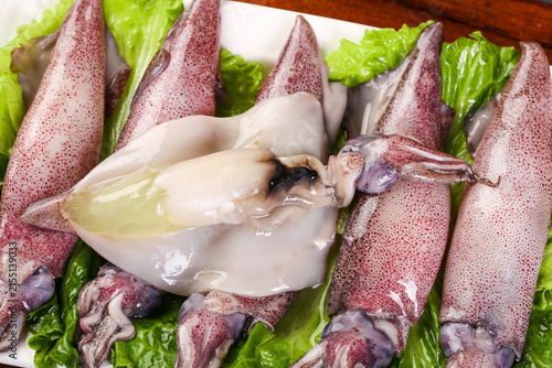 Fresh Raw Squid and Wild Seafood from Shandong on Lettuce Display