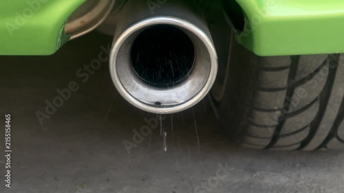 White Steam from Car Exhaust Pipe While Engine Is Running