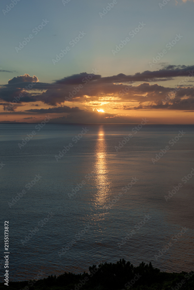 Fototapeta premium Dramatic sunset over the ocean near Zamami Island, Okinawa, Japan