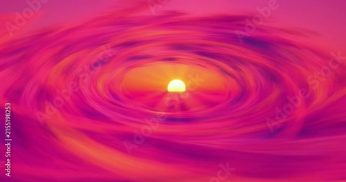 Vibrant sunrise captured in circular motion animation featuring glowing golden light rays through intense pink swirling clouds sky video footage