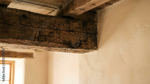 Rustic Wooden Beam Accent in a Renovated Interior Space