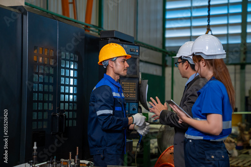 Team of diversity worker inspecting inside steel manufacturing factory while listening to senior manager advice on improvement of capacity and productivity