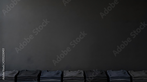 This digitally rendered image showcases a dark and abstract composition featuring a gradient of gray tones and pixelated forms creating a mysterious and modern