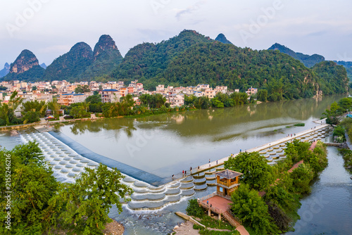 Obraz na płótnie Fish Scale Dam and Karst Mountains on the Lijiang River in Lipu, Guilin, Guangxi