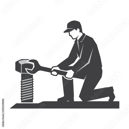 Silhouette of worker tightening a large bolt with wrench