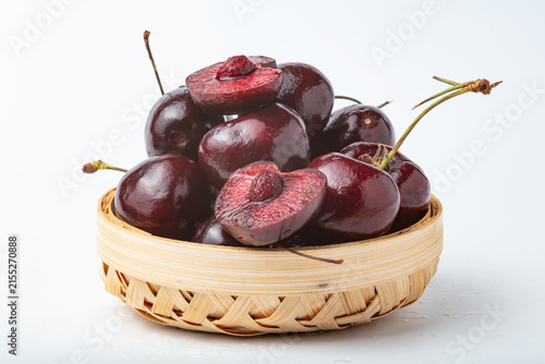 Fresh Dark Cherries in a Woven Basket