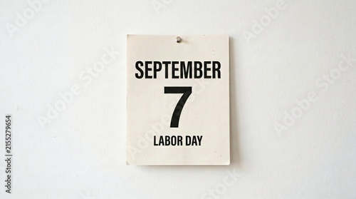 Minimalist labor day reminder for september seventh on white wall