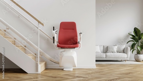 Stairlift chair installed on residential home staircase with stairlift mobility disability staircase assistive