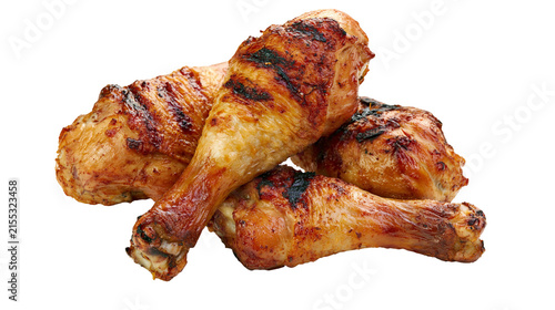 Canvas Print Golden brown grilled chicken drumsticks with char marks, isolated on transparent