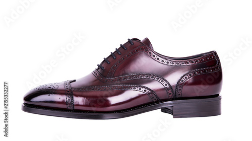 Obraz na plátne Glossy burgundy leather wingtip oxford dress shoe with brogue detailing, isolate