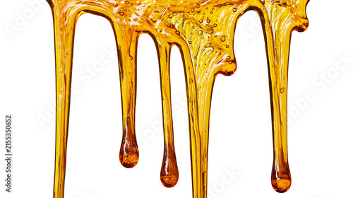 Fotografía Golden viscous honey dripping in strands, isolated on transparent background