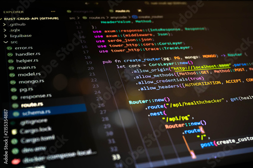Abstract close-up of colorful programming code displayed in a software development environment, representing backend development, system logic, web services and modern digital technology concepts.