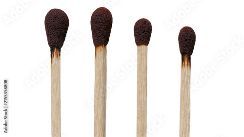 Fotografie Four wooden matches with dark brown heads, isolated on transparent background