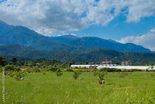 Canvastavla Modern greenhouse agriculture and pasture in a fertile mountain valley of southw