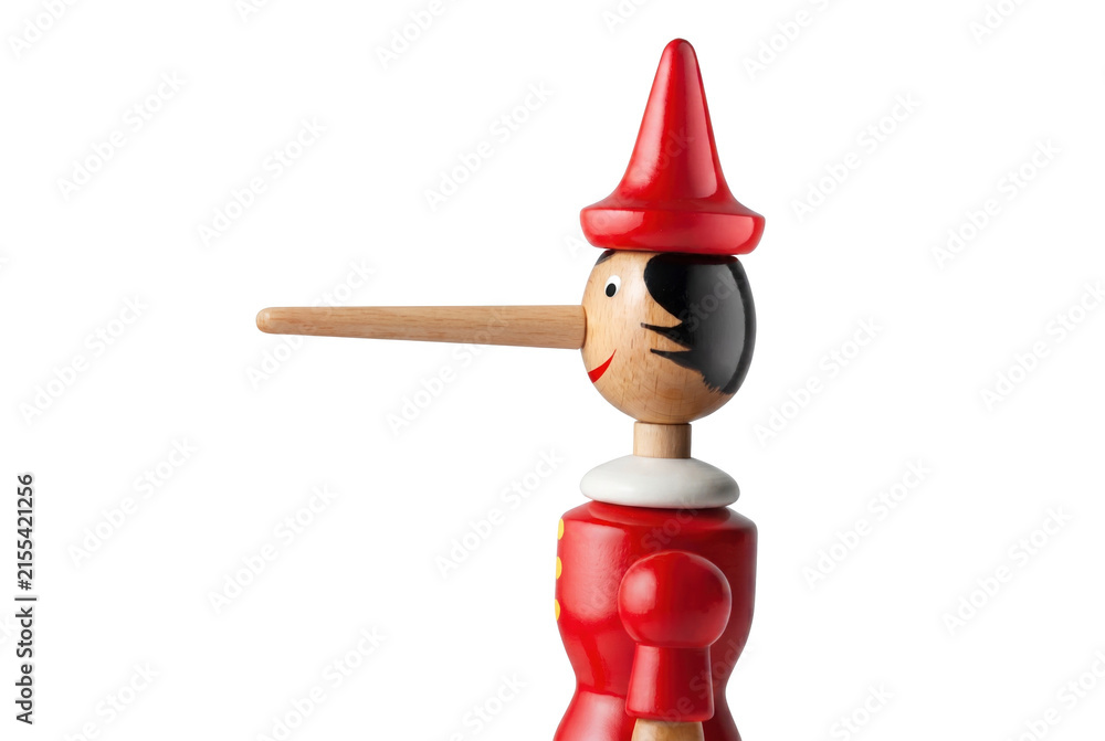 Naklejka premium Handcrafted wooden Pinocchio puppet with a long nose and red hat