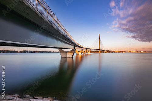 Kruunuvuorensilta Bridge and Baltic Sea Coastline in Helsinki, Finland
A wide long-exposure view of the modern Kruunuvuorensilta cable-stayed bridge spanning the Baltic Sea in Helsinki, Finland.
