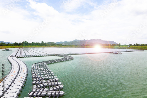Floating Solar Panel. Solar photovoltaic panel PV System in Industry lake water pond. Saving Energy with Clean Power.
