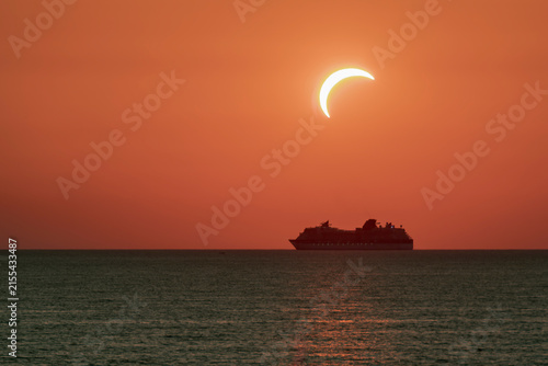 A cruise ship sails near Livorno, Italy, during the solar eclipse of August 12, 2026