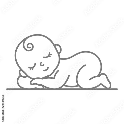 Sleeping baby on stomach with peaceful expression and closed eyes