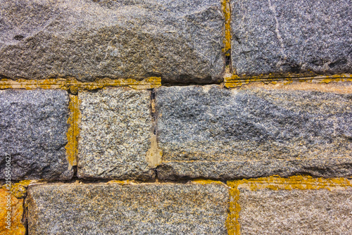 closeup wall from stones, outdoor architecture background