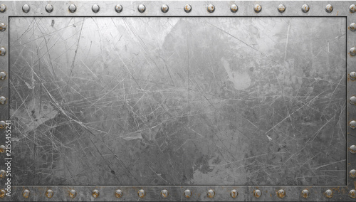 Riveted metallic panel with scratches and texture for industrial backgrounds