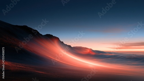 Dramatic mountain sunrise with fiery clouds