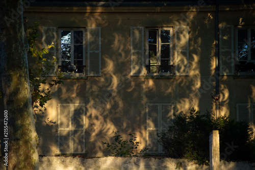 Cuadro en lienzo Crescent shadow projections from a partial solar eclipse appear on a building facade in Paris, France