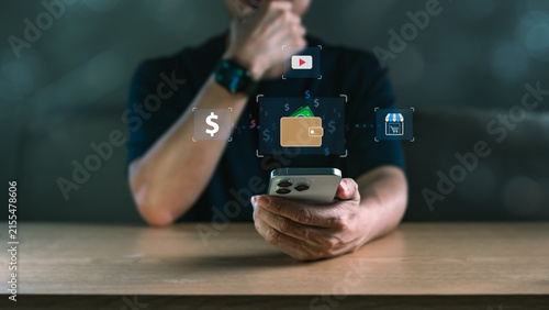 фотографія Person Holding Smartphone with Digital Wallet and Online Commerce Icons