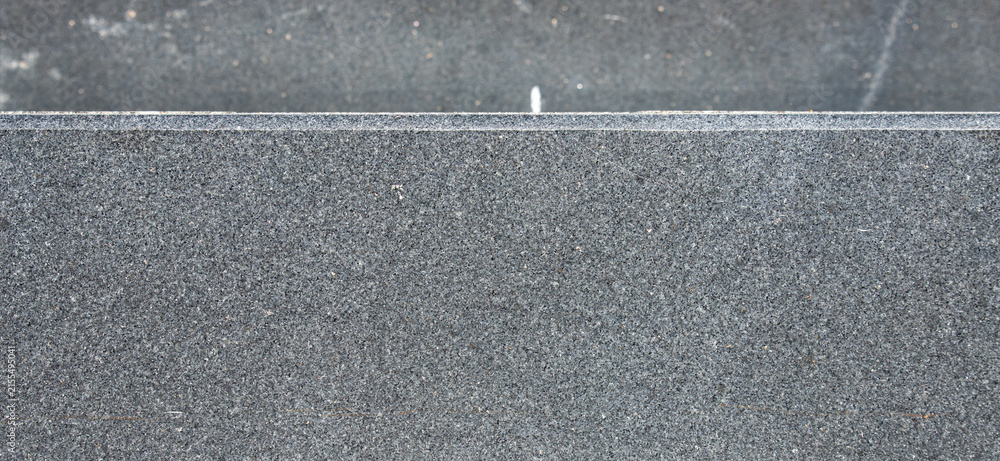 Fototapeta premium Dark grey granite stone slab edge texture background