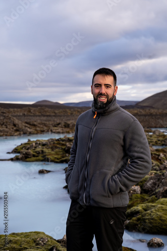 Three Quarter Portrait of Smiling Male Tourist near Blue Lagoon Iceland