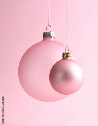 Two Pink Christmas Baubles Hanging Together