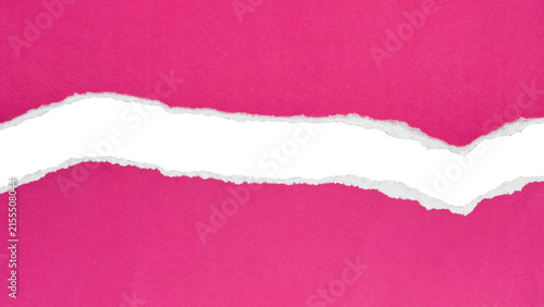 Pink paper torn to reveal a smooth white strip