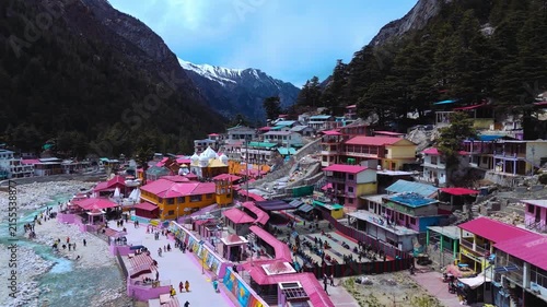 Cinematic Drone Shot of Gangotri Temple on Its Opening Day Surrounded by Pilgrims, Flowing Bhagirathi River and Majestic Himalayan Mountains in Uttarakhand