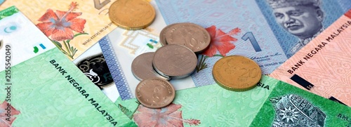 Photography Malaysian ringgit money banknotes and coins on table